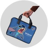 Blue laptop bag with cartoon character design held by a hand on a light gray background