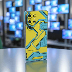 Circuit Smartphone Skin with yellow and blue geometric design on a reflective surface with blurred background