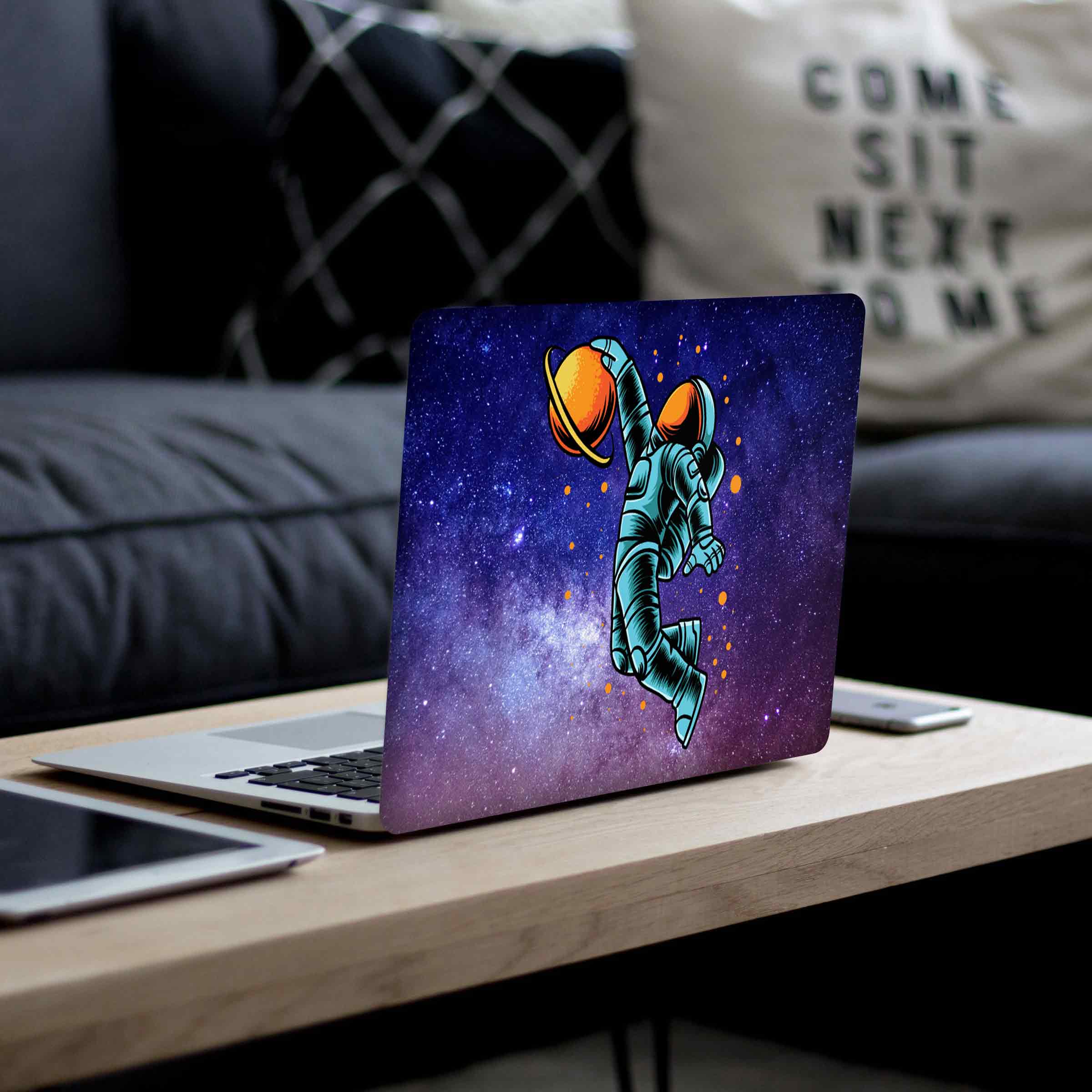Saturn and The Astronaut Laptop Skins Secondary image
